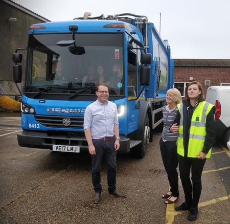 Photo: Simon (centre) in front of one our our waste and recycling trucks, with Jean and Kristy to the right